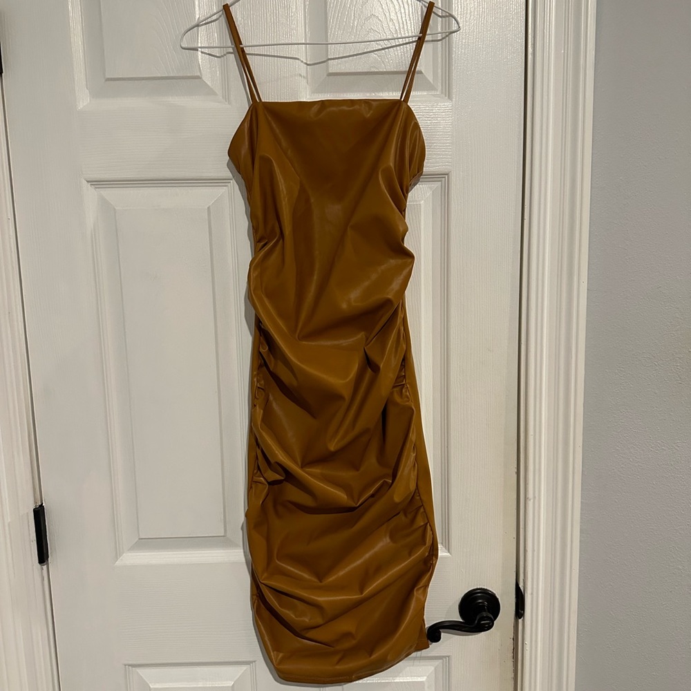 Faux leather, camel color dress.